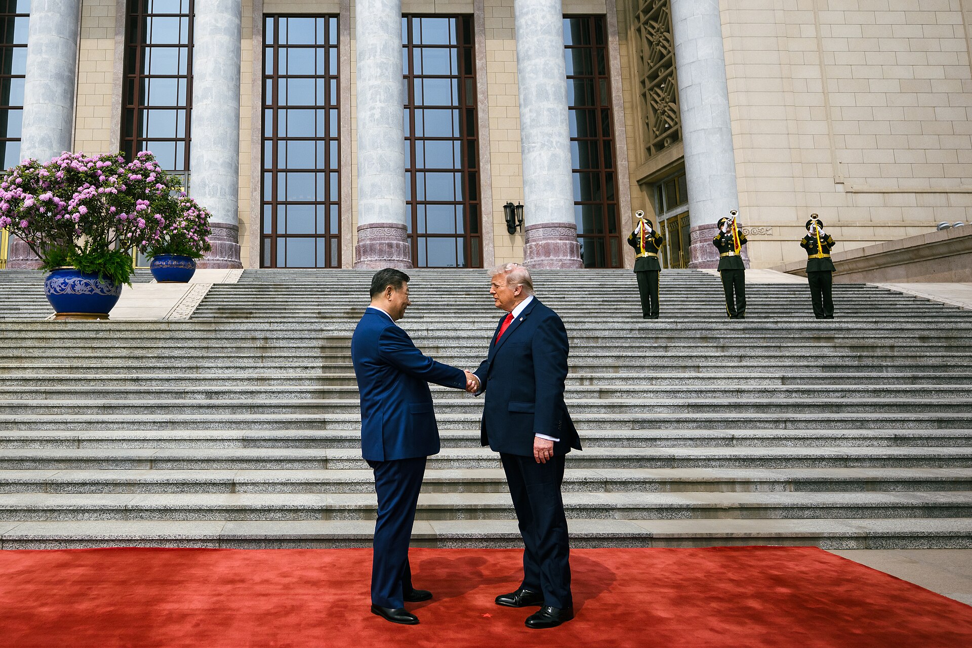 Xi Jinping welcomes Donald Trump on the steps of the Great Hall of the People, Beijing, 14 May 2026.
